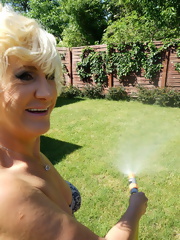 Sexy white hair mature woman getting Hot in her garden