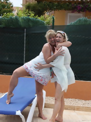Two Hot German mature making out on vacation