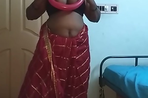 desi indian tamil telugu kannada malayalam hindi horny housewife vanitha wearing cerise red colour saree showing broad in the beam gut increased by shaved pussy press hard gut press nip rubbing pussy masturbation