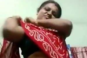Tamil aunty liquidates saree and shows big boobs