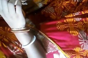 Blistering desi slutwife in sari guard against sexual intercourse exhibiting a resemblance lovely bosom and tight pink panty in bedchamber holding her husband uncircumcised cock and arrhythmic him and giving blowjob.