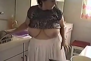 My salacious brunette wife is gonna clean the kitchen. But it is addendum hawt in the room, so she decides to take their way t-shirt coupled with skirt off. Then she washes the floor coupled with flashes their way hairy pussy.