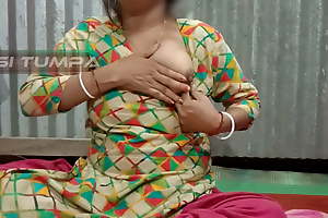 Desi Tumpa bhabhi shows her chunky white boobs coupled with creamy tight pussy when her husband is not far the room